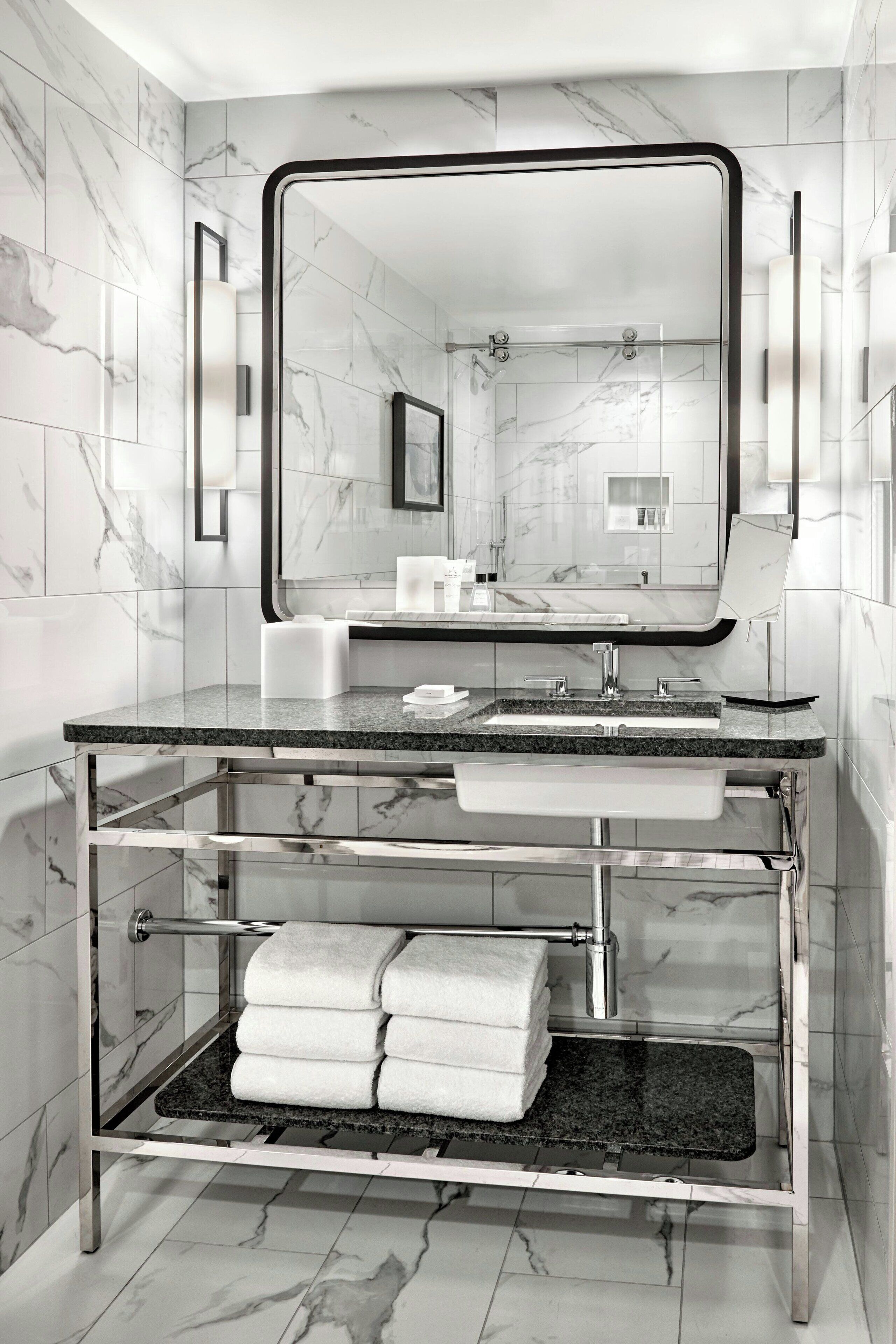 combined shower/bathtub, hair dryer, bathrobes, towels