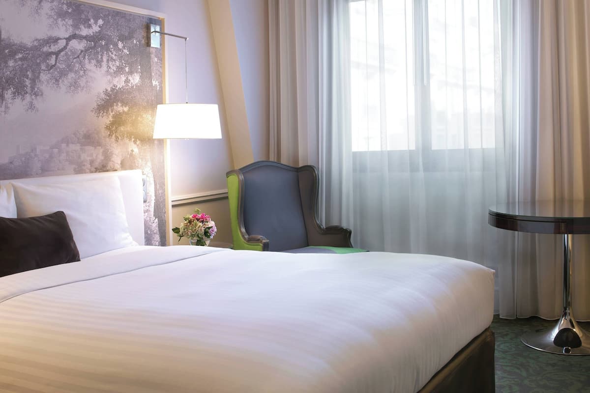Ropa de cama de alta calidad y minibar