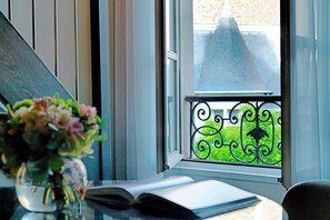 Suite, 1 King Bed with Sofa bed, Non Smoking, Garden View | 1 bedroom, premium bedding, minibar, in-room safe