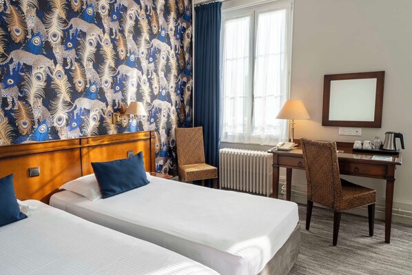 Premium bedding, in-room safe, individually decorated