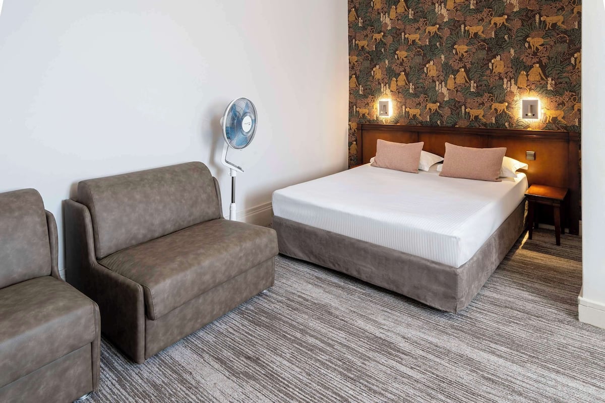 Habitación familiar, varias camas, para no fumadores | Ropa de cama de alta calidad y caja de seguridad en la habitación