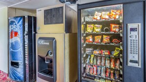 A vending machine with snacks and a Pepsi dispenser.
