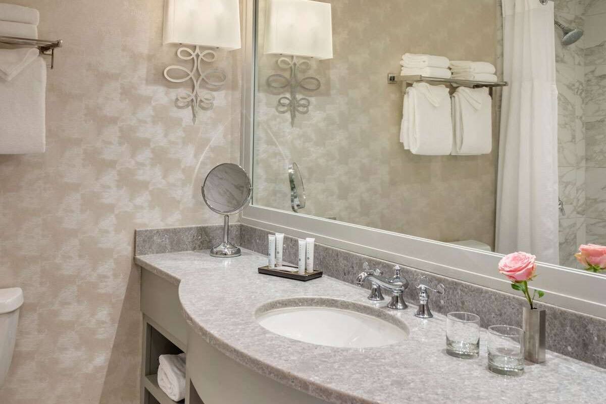 premium bedding, pillow-top beds, desk, blackout curtains