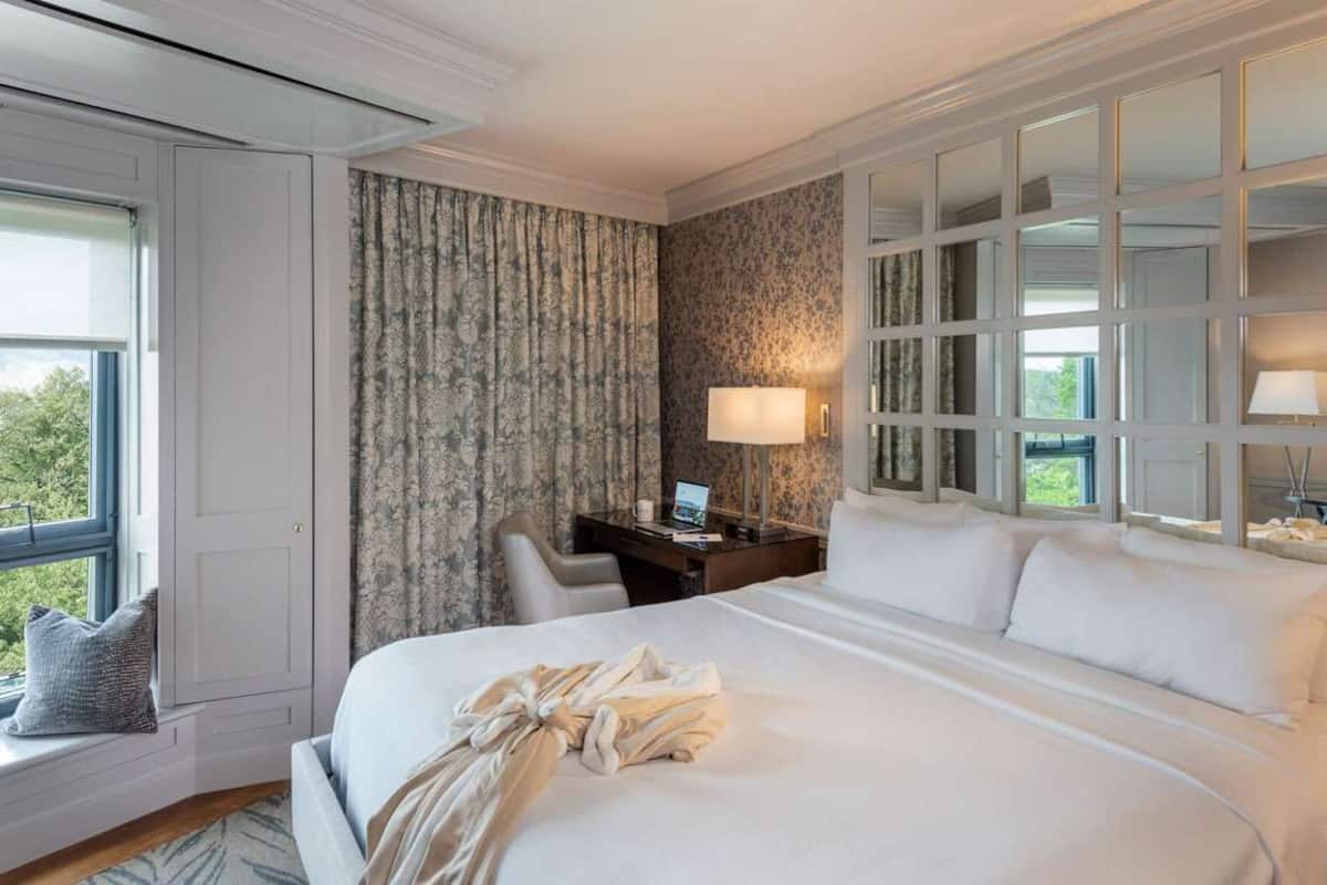 premium bedding, pillow-top beds, desk, blackout curtains