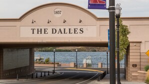A street sign with "The Dalles" and "1857" indicating the location and year. - The Dalles Inn (The Dalles)