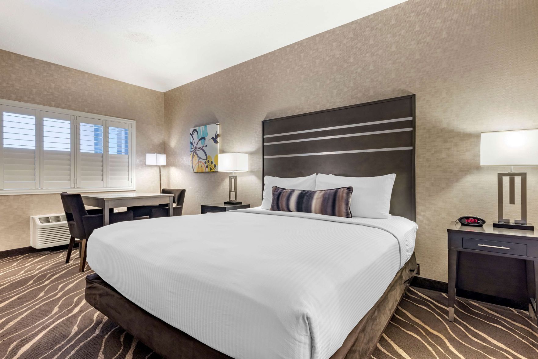 Desk, laptop workspace, iron/ironing board, free cribs/infant beds