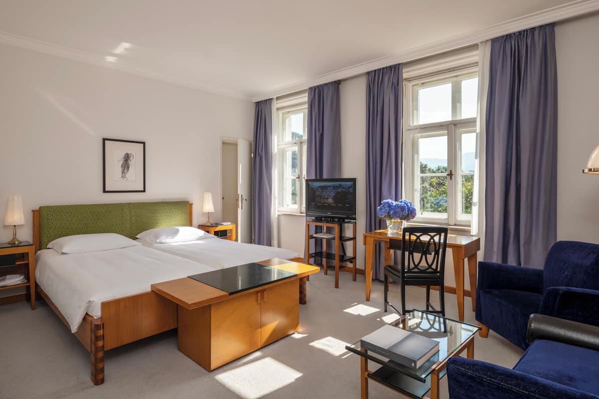 hypo-allergenic bedding, down duvets, minibar, in-room safe