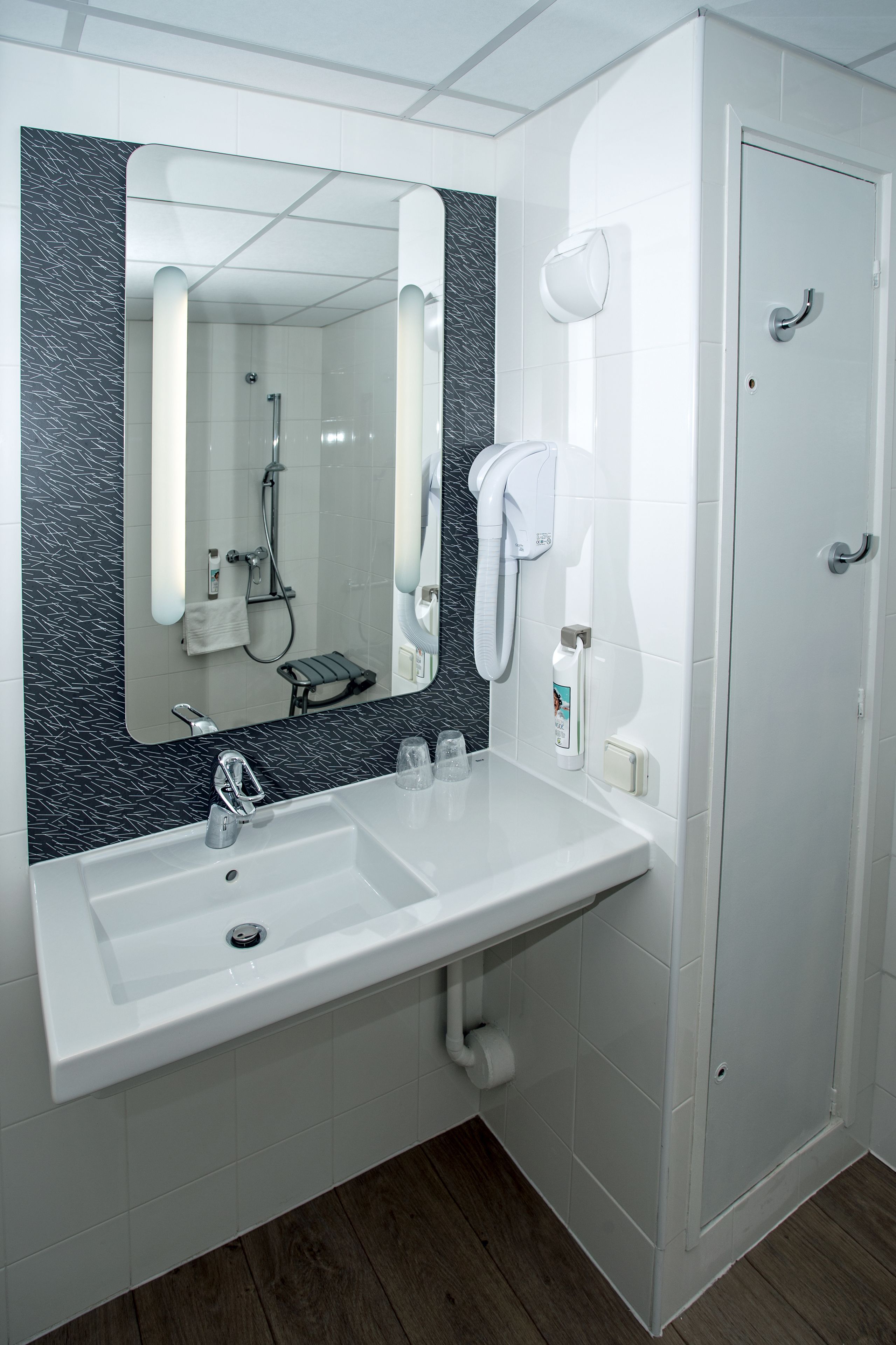 shower, eco-friendly toiletries, hair dryer, towels