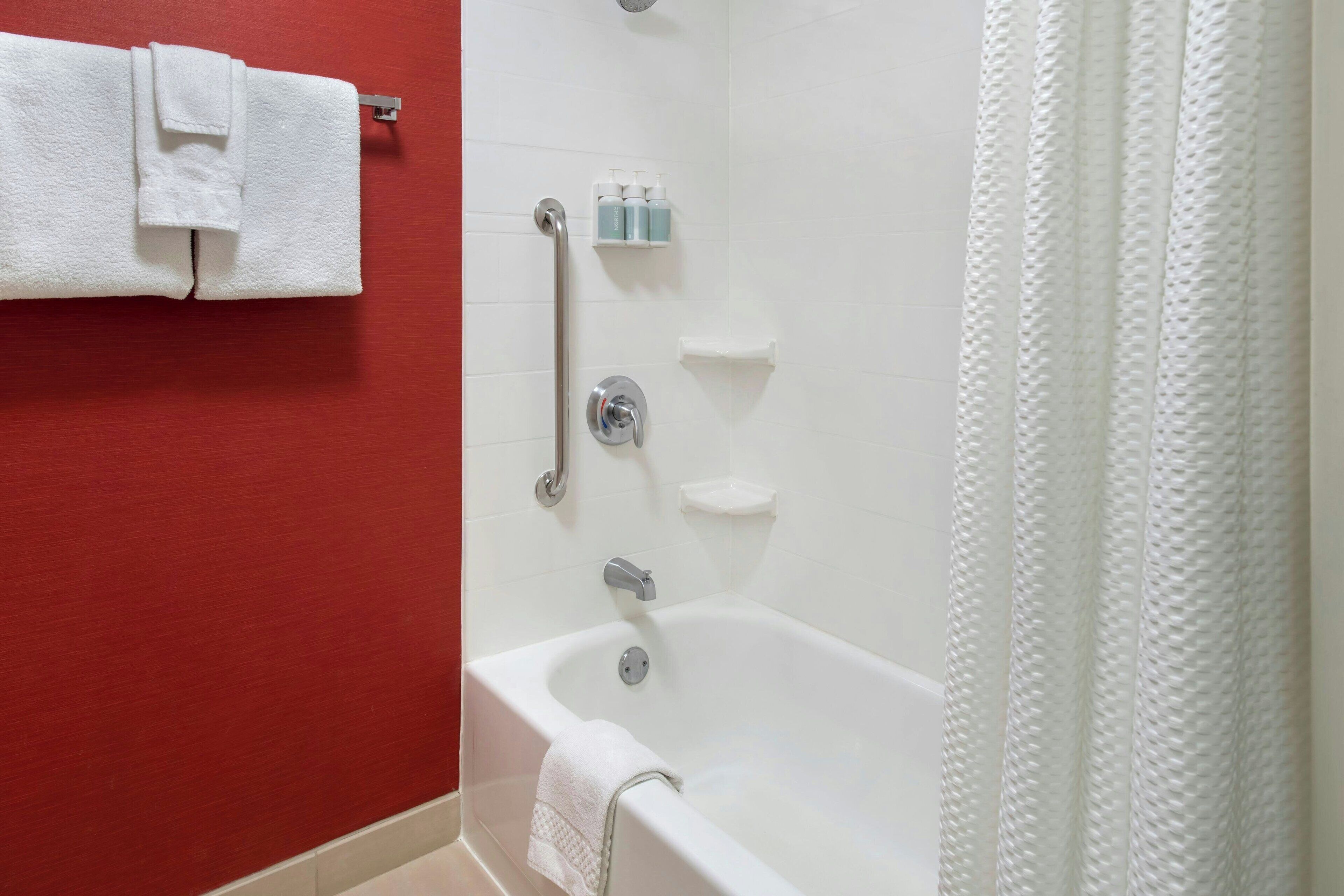 combined shower/bathtub, free toiletries, hair dryer, towels