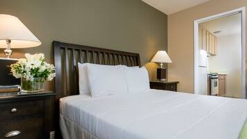 Suite, 1 Queen Bed | In-room safe, blackout curtains, iron/ironing board, cots/infant beds