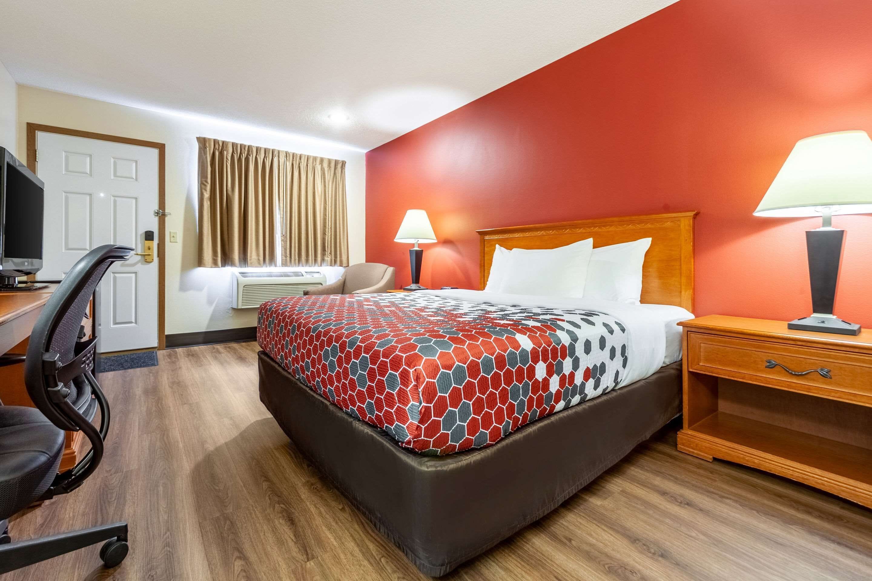 desk, blackout curtains, iron/ironing board, rollaway beds