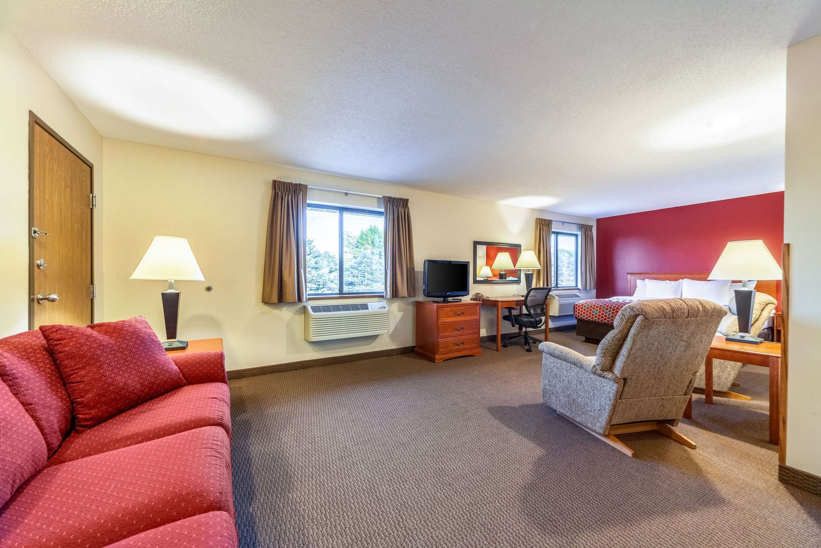 desk, blackout curtains, iron/ironing board, rollaway beds