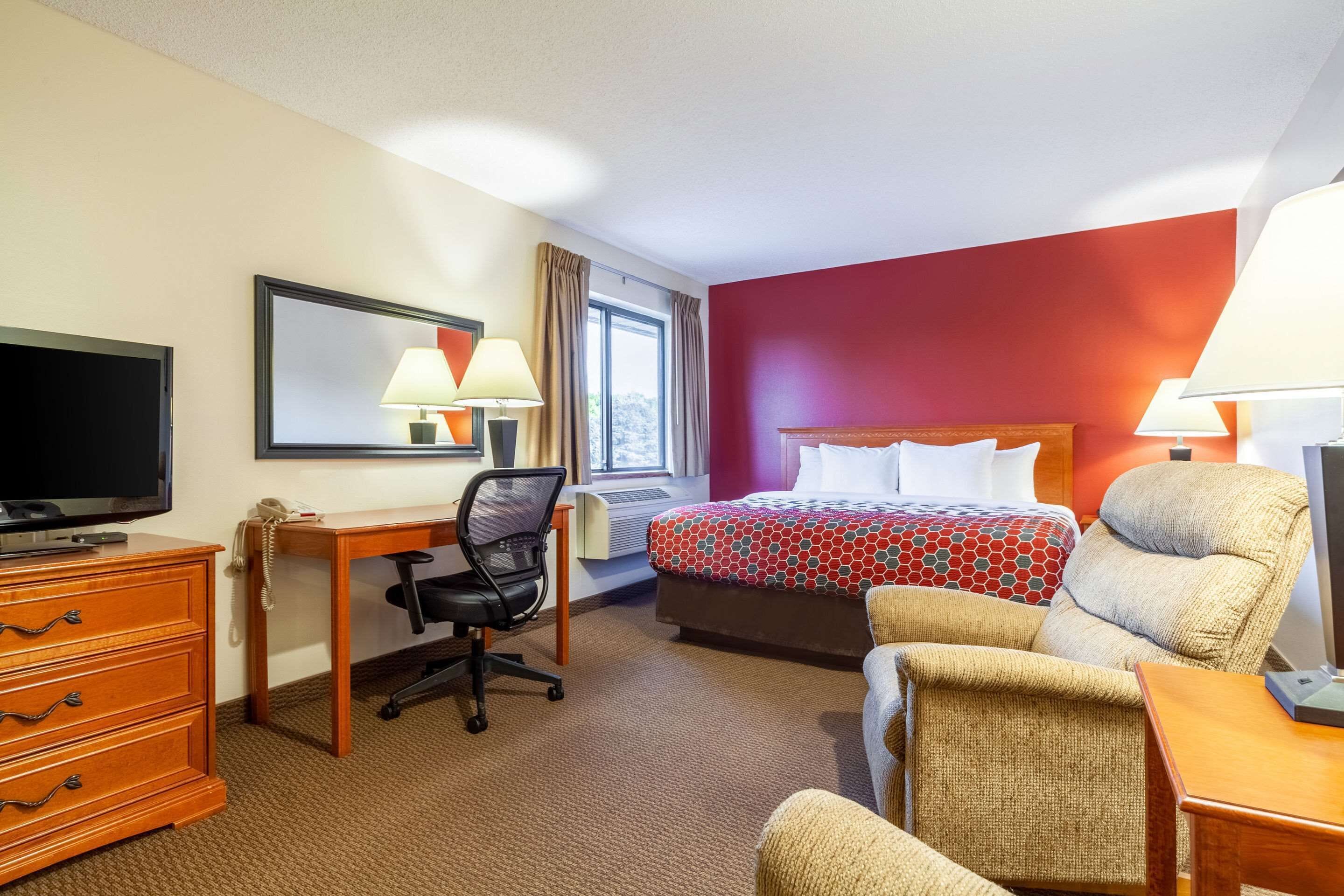 desk, blackout curtains, iron/ironing board, rollaway beds