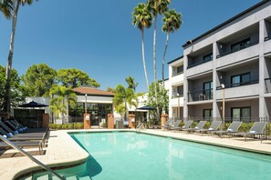 Outdoor pool, open 7:00 AM to 10:00 PM, pool umbrellas, sun loungers