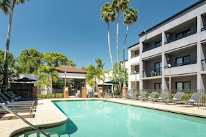 Outdoor pool, open 7:00 AM to 10:00 PM, pool umbrellas, sun loungers