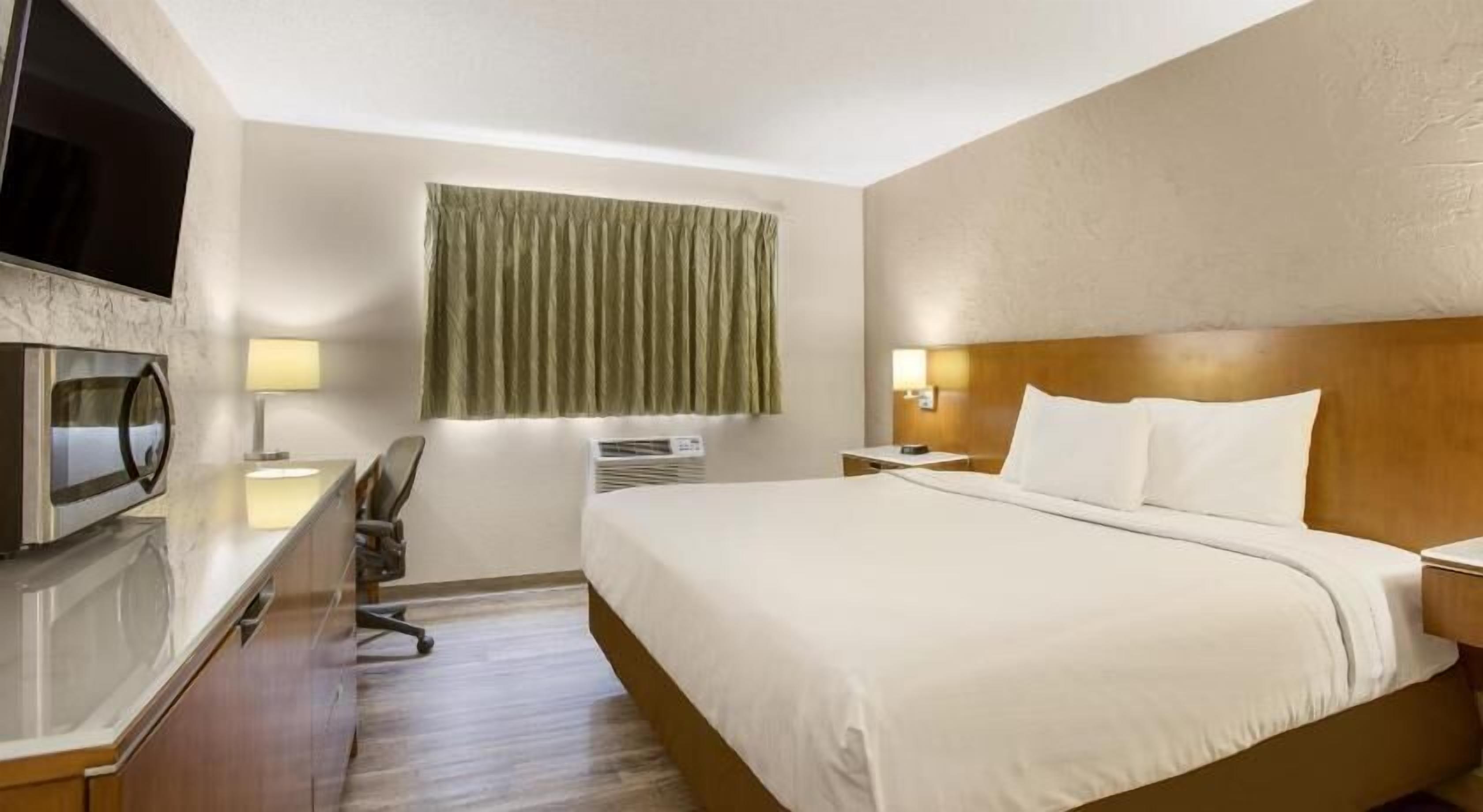 Desk, blackout drapes, free WiFi, bed sheets