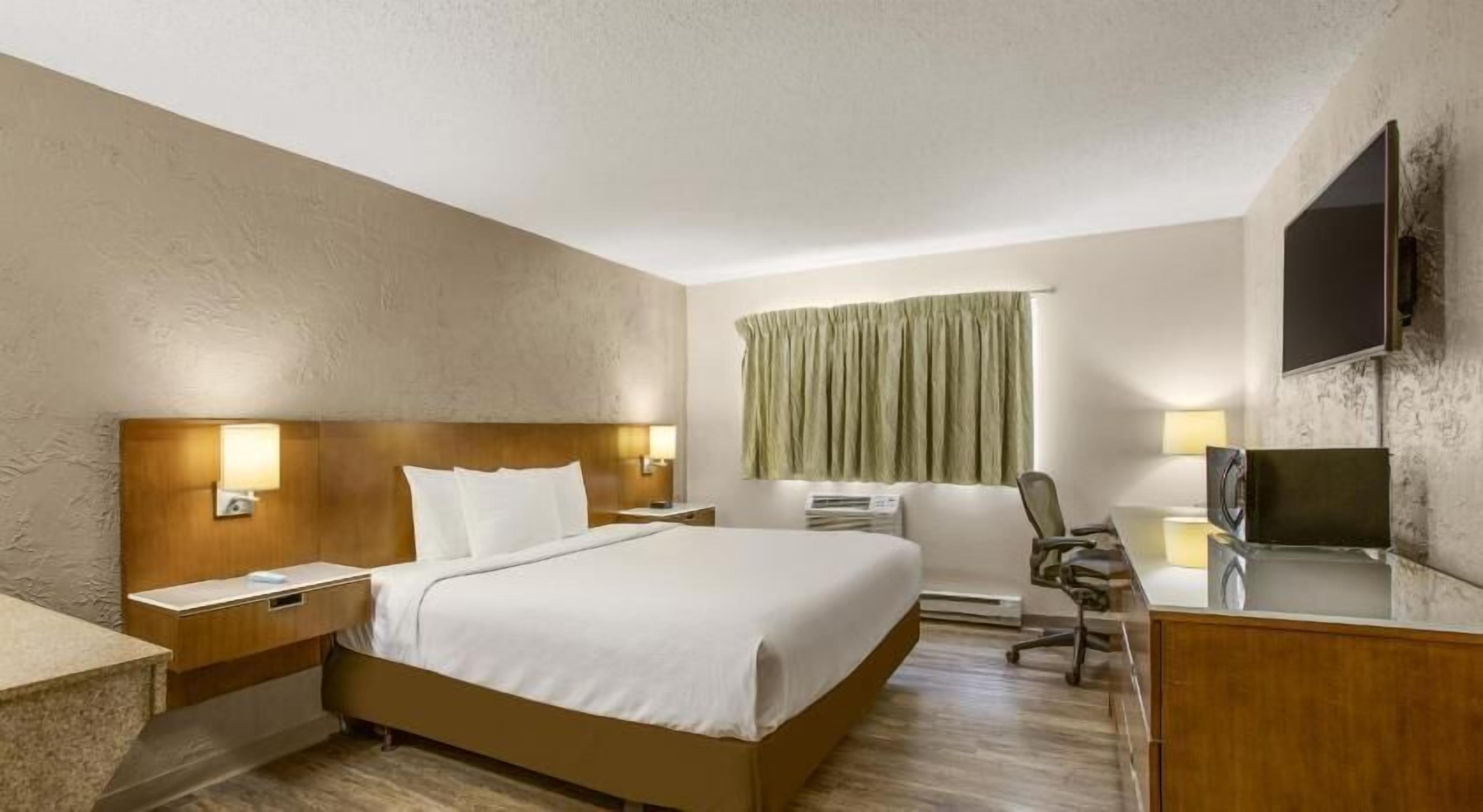 Desk, blackout drapes, free WiFi, bed sheets