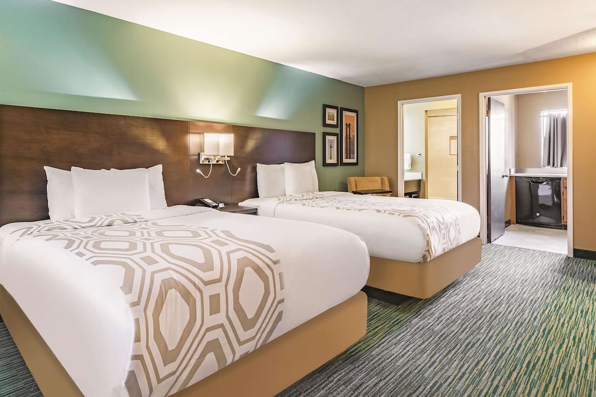 superior room, 2 queen beds, non smoking (full kitchen) | premium bedding, desk, blackout curtains, iron/ironing board