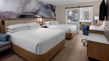 Hypo-allergenic bedding, down duvets, in-room safe, desk