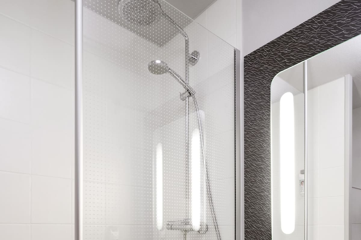 eco-friendly toiletries, hair dryer, towels