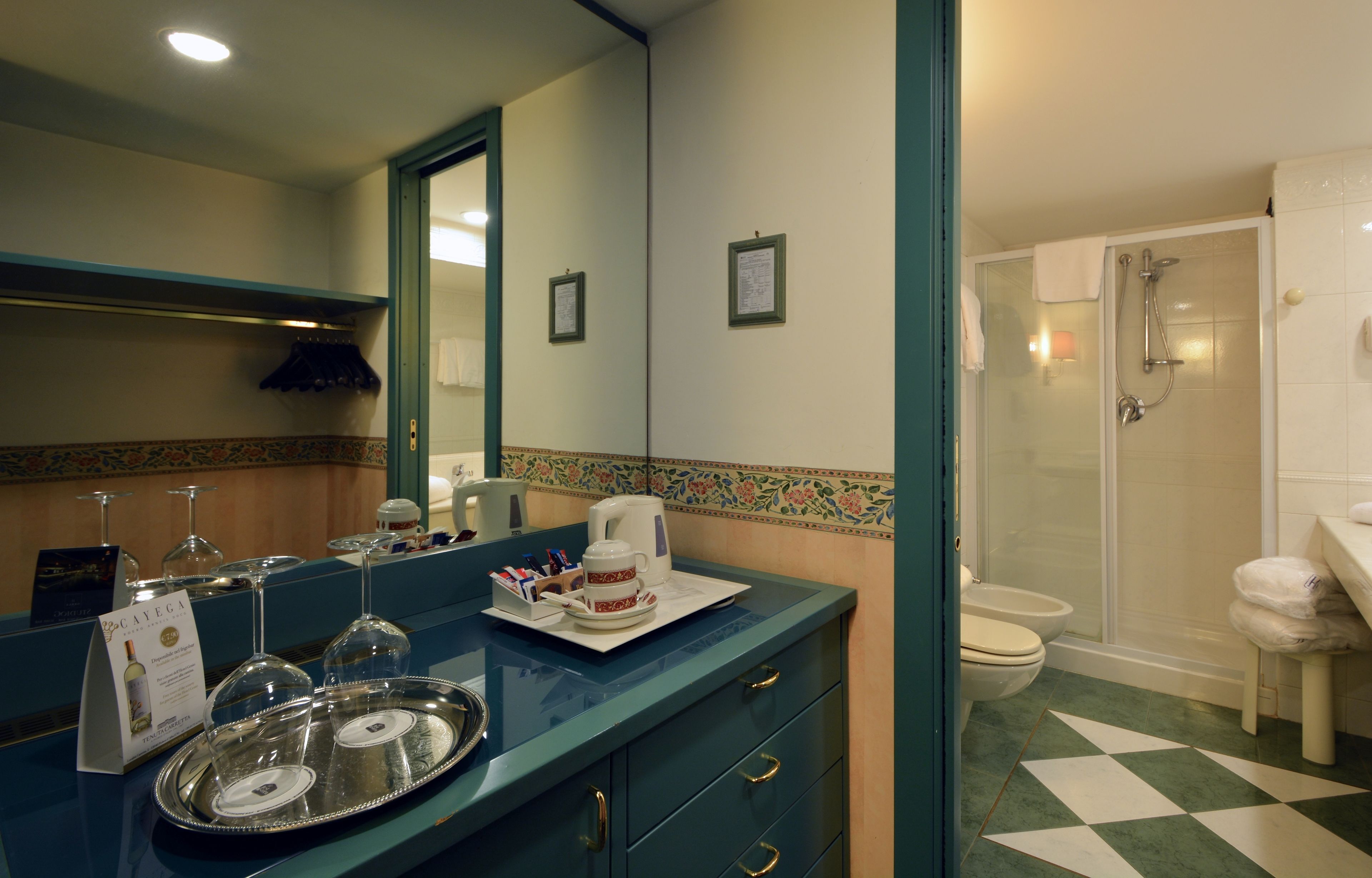 junior suite, 1 queen bed | bathroom | rainfall showerhead, towels