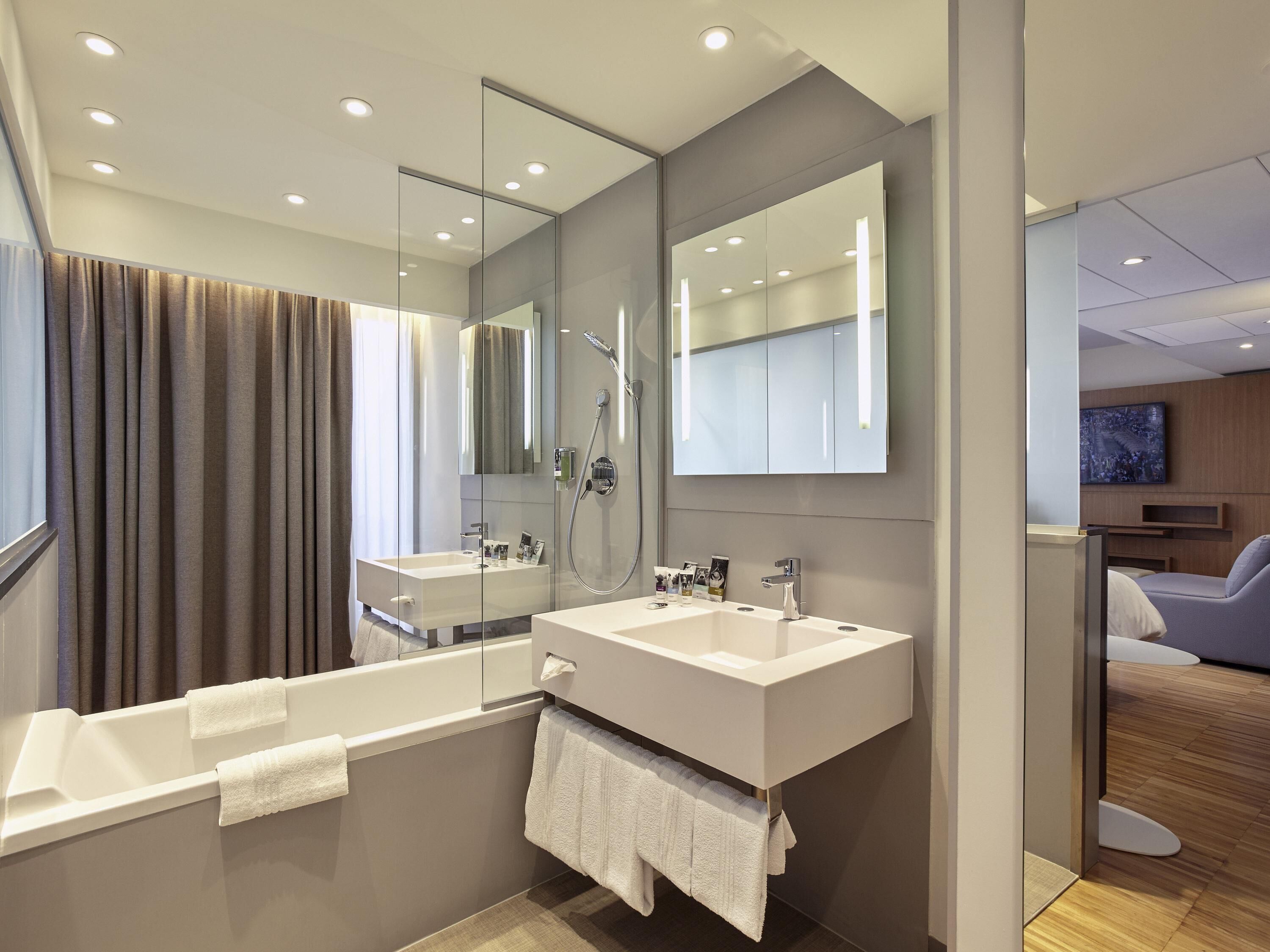 eco-friendly toiletries, hair dryer, bathrobes, slippers