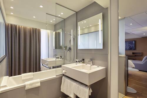 Eco-friendly toiletries, hair dryer, bathrobes, slippers