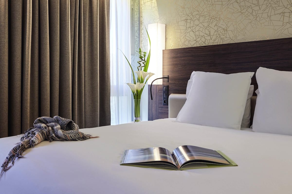 Ropa de cama de alta calidad y minibar