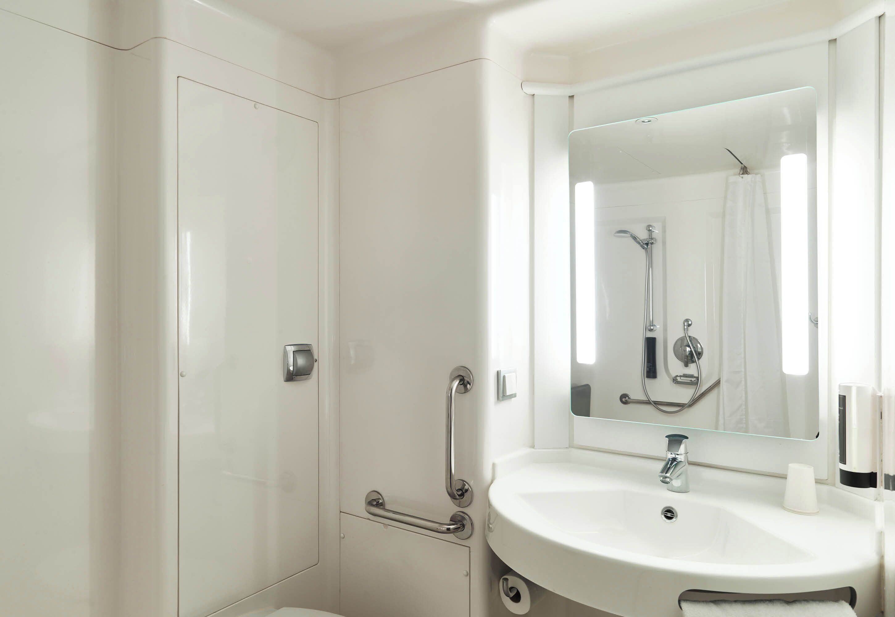 double room, mobility accessible | bathroom | shower, towels, soap, shampoo