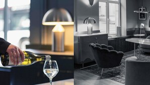 A modern interior with a bar area, a dining table, and a sofa. - Mercure Nancy Centre Place Stanislas Hotel (Nancy)