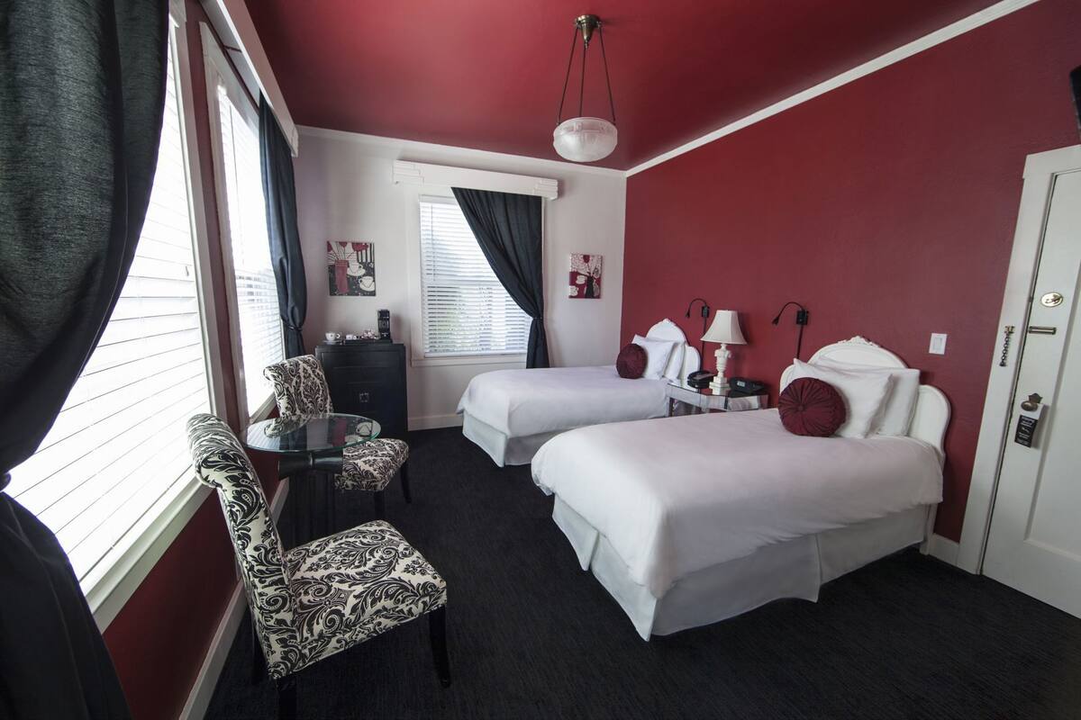 Hypo-allergenic bedding, down duvets, pillow-top beds, in-room safe