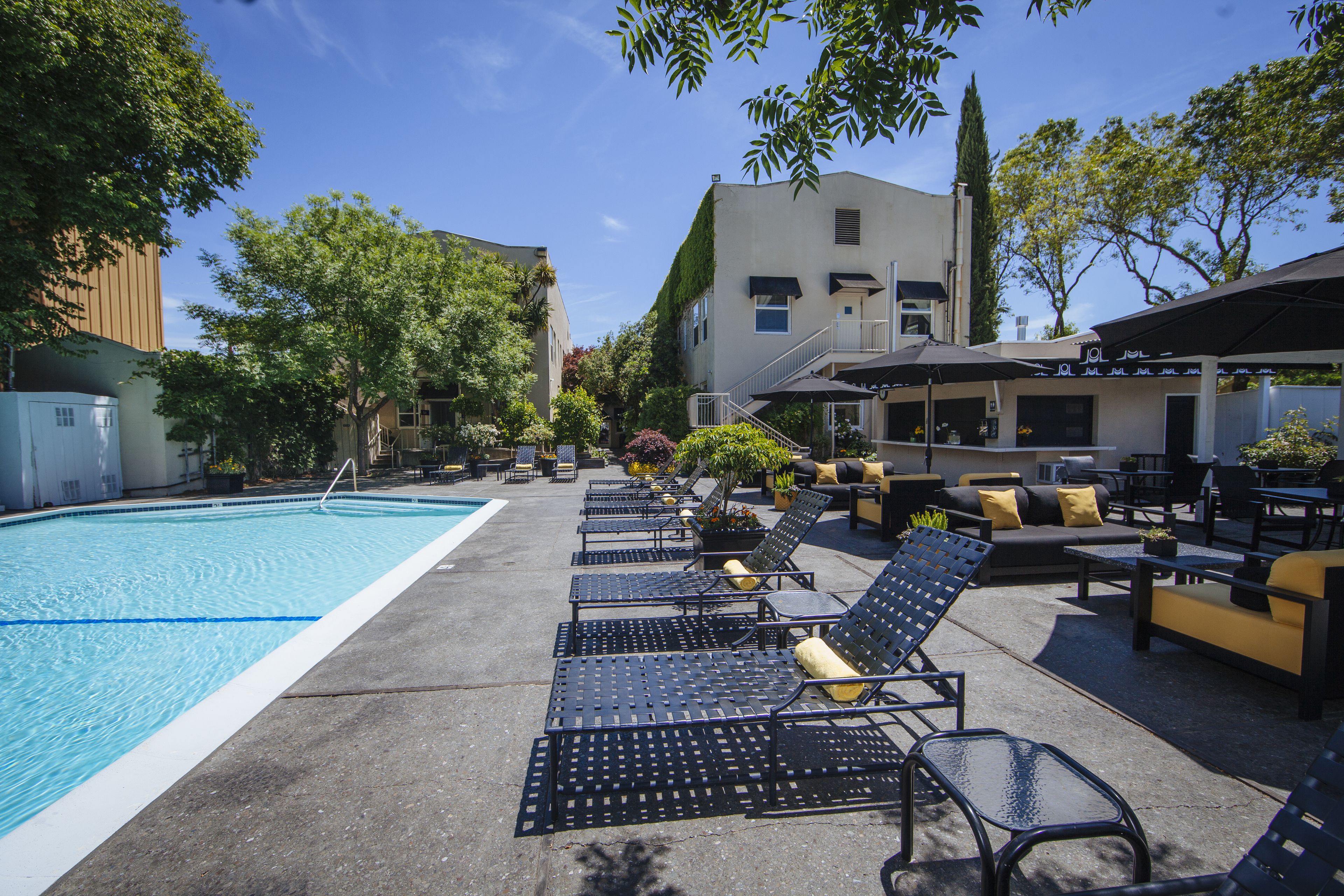 outdoor pool, a heated pool, open open 24 hours a day, free pool cabanas