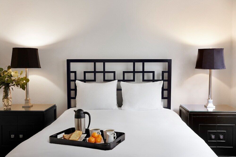 Hypo-allergenic bedding, down comforters, pillowtop beds, in-room safe