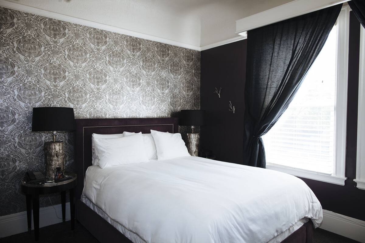 Hypo-allergenic bedding, down duvets, pillow-top beds, in-room safe