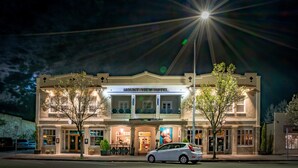 The Mount View Hotel with a two-story structure, a balcony, and a visible entrance. - Mount View Hotel & Spa (Calistoga)