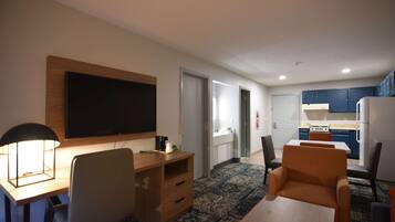 Suite, 1 Bedroom, Non Smoking | Desk, laptop workspace, blackout drapes, iron/ironing board