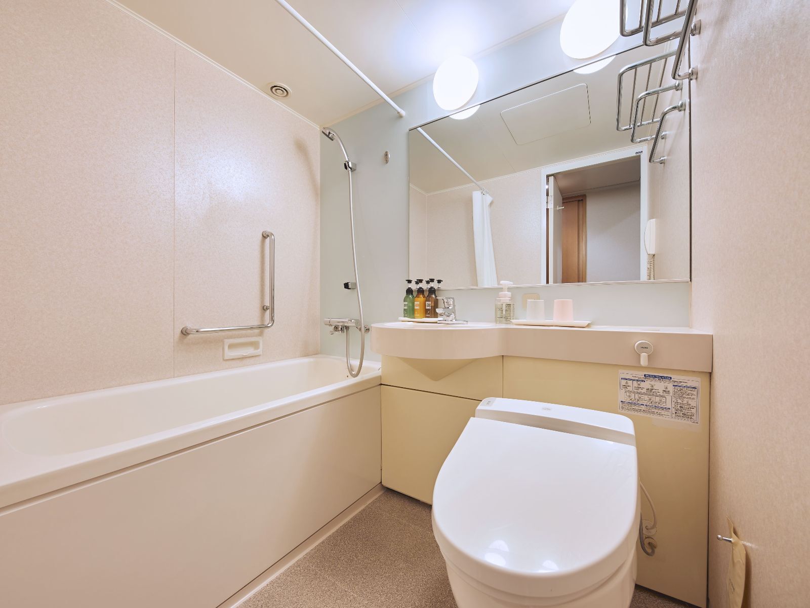 combined shower/bathtub, free toiletries, hair dryer, slippers