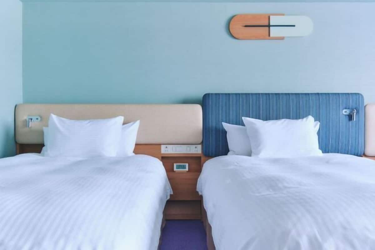 Down duvets, laptop workspace, blackout curtains, free WiFi