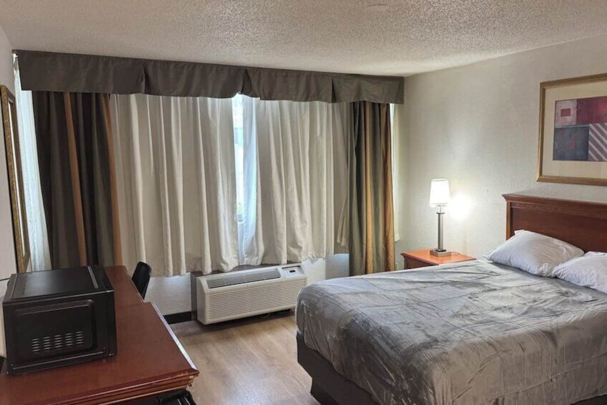 Desk, blackout drapes, iron/ironing board, free WiFi