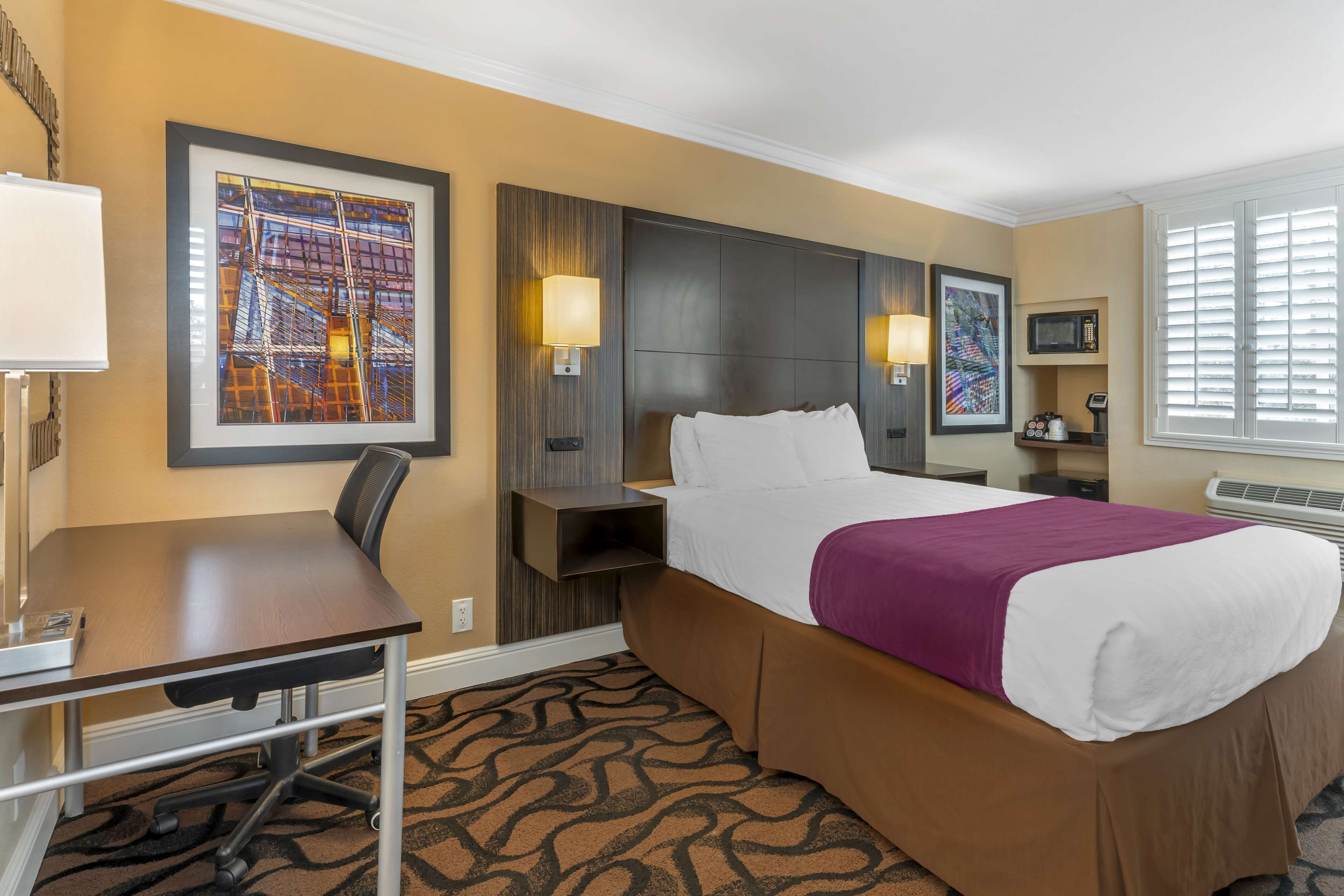 pillow-top beds, desk, laptop workspace, iron/ironing board