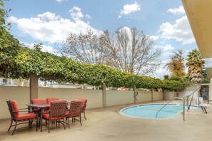 Outdoor pool, open 10:00 AM to 10:00 PM, sun loungers