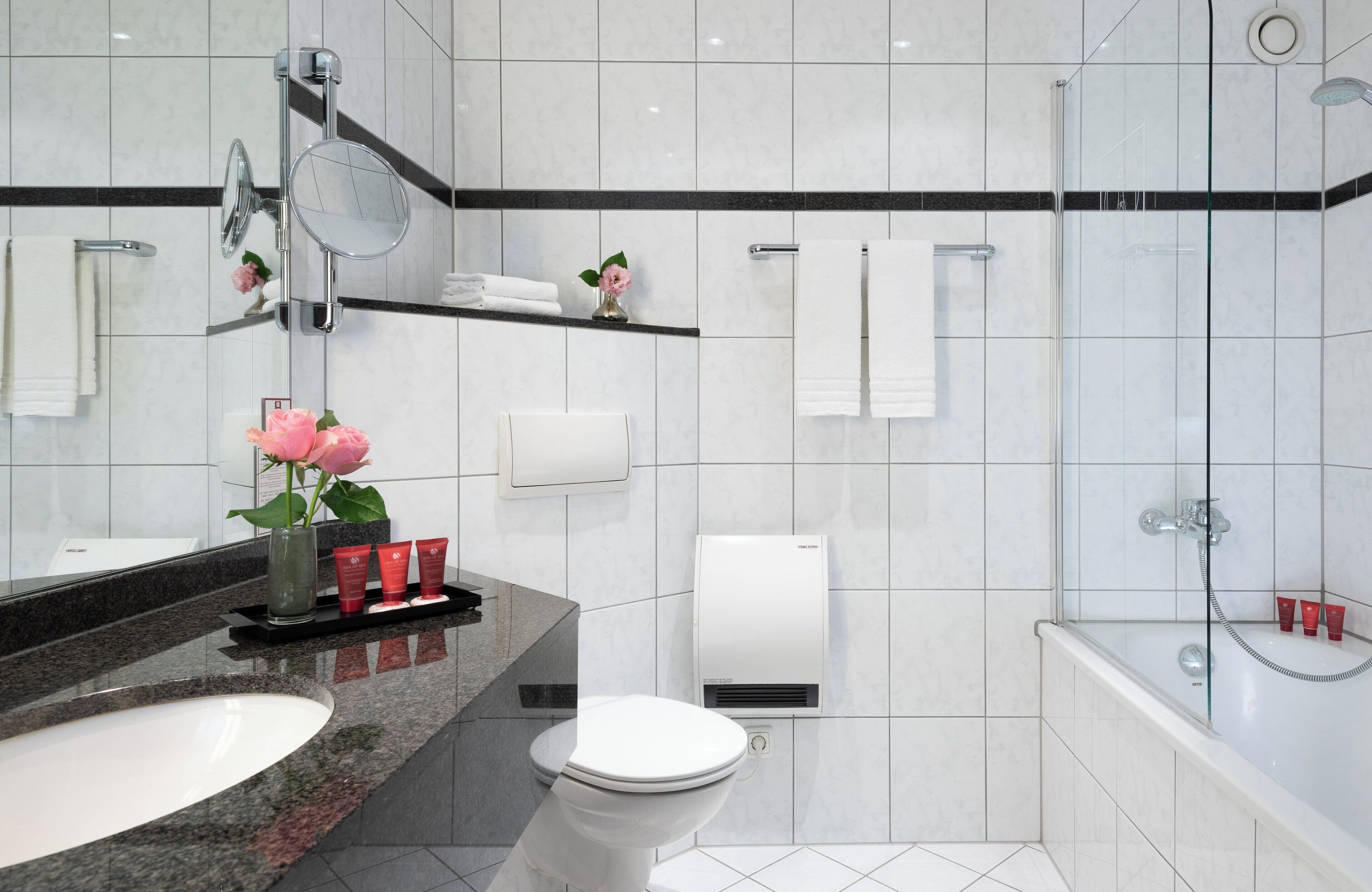 superior double or twin room | bathroom | bathtub, eco-friendly toiletries, hair dryer, towels