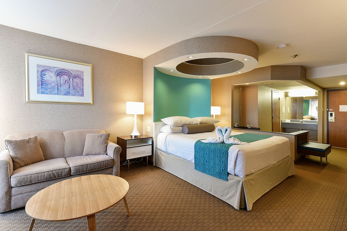 superior suite, 1 king bed, non smoking, fireplace | premium bedding, in-room safe, desk, blackout curtains