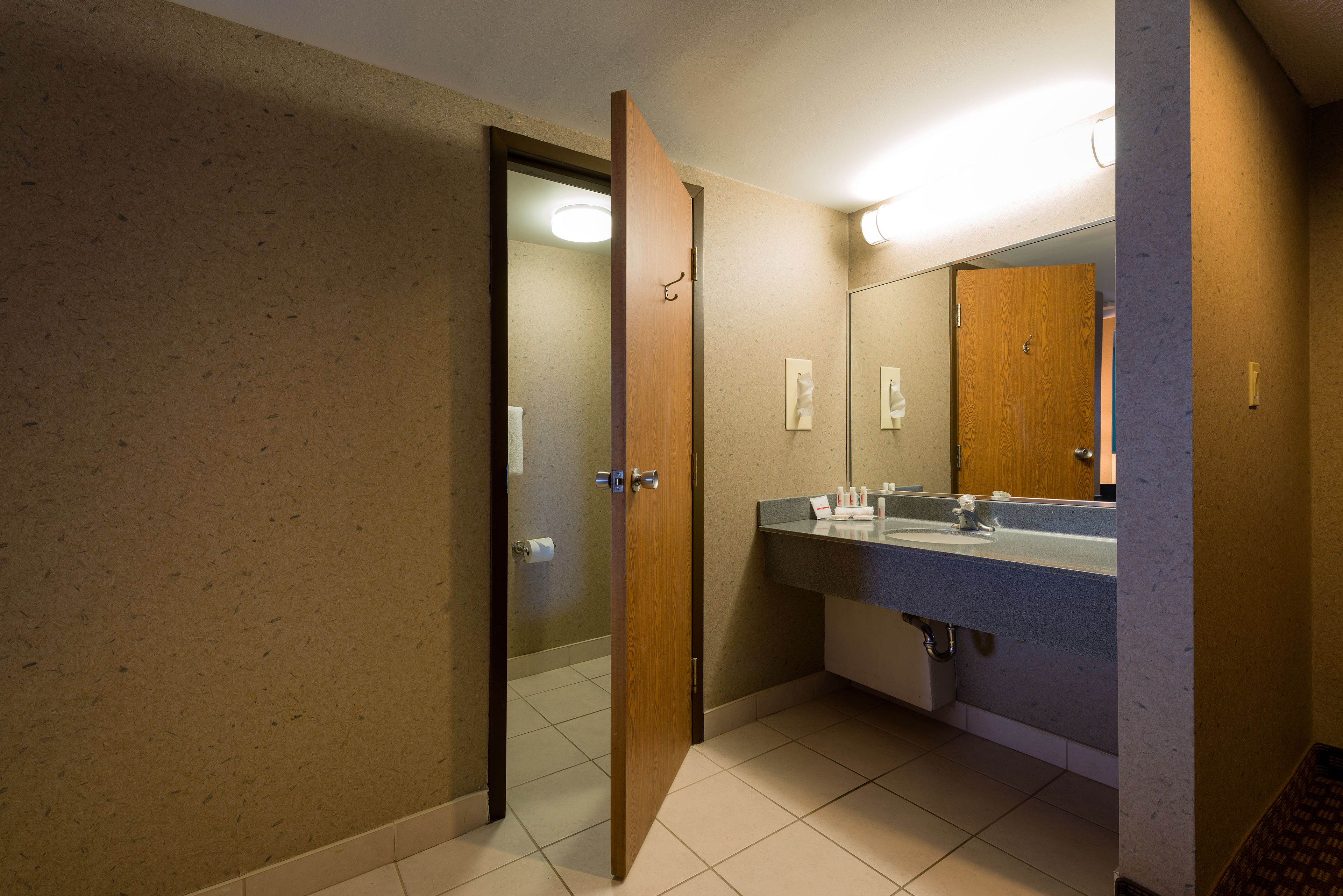 superior suite, 1 king bed, non smoking, fireplace | bathroom | eco-friendly toiletries, hair dryer, towels, soap