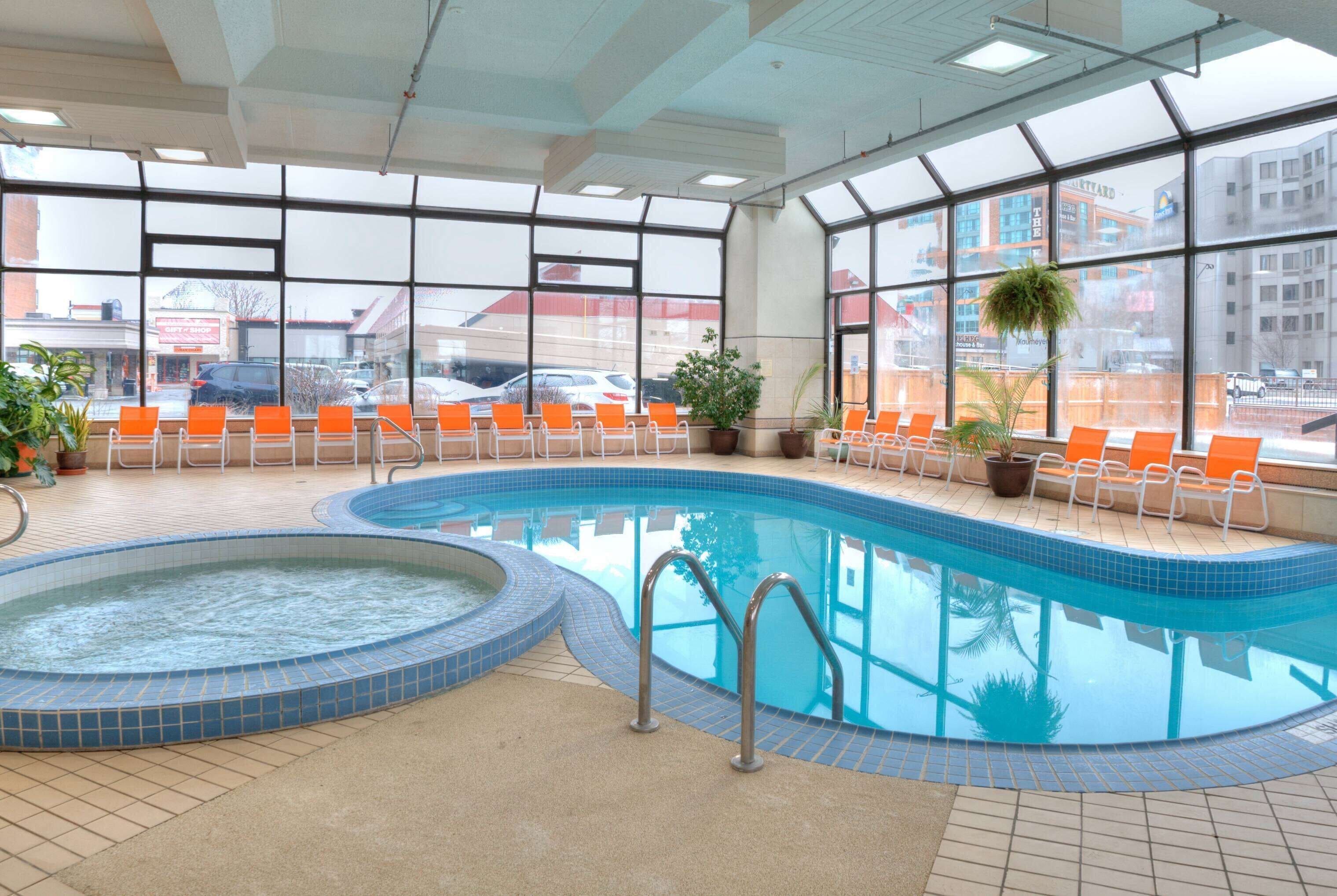 indoor pool, seasonal outdoor pool, pool loungers