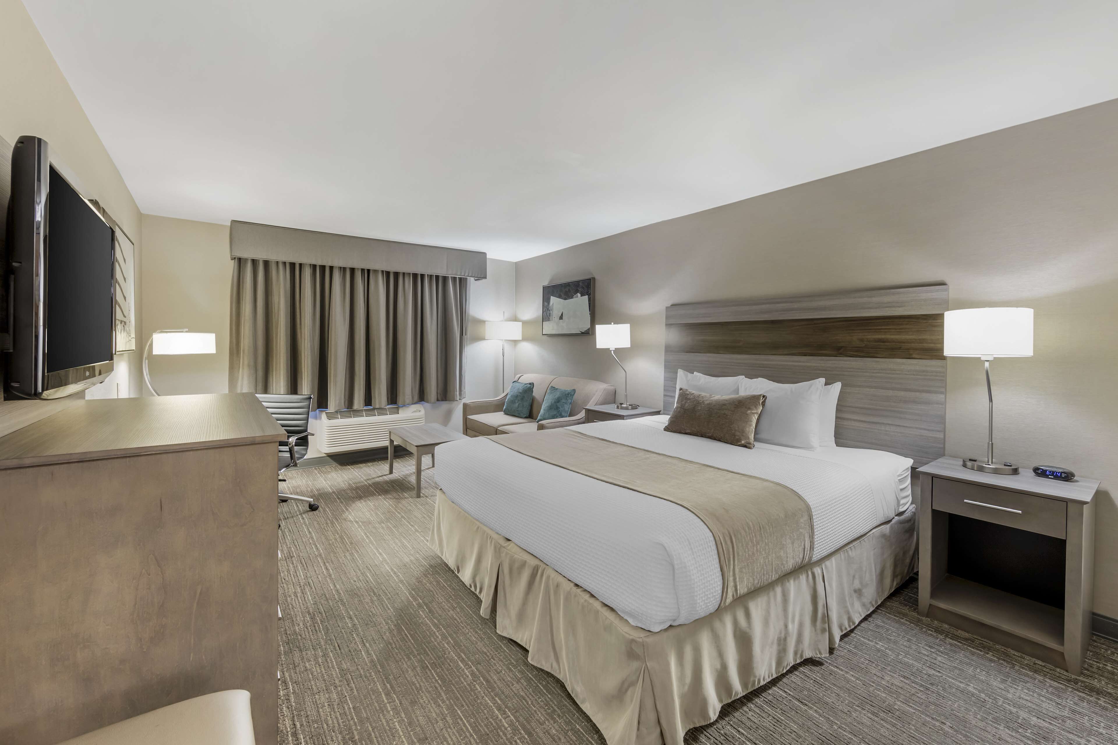 deluxe room, 1 king bed with sofa bed, non smoking, refrigerator & microwave (with sofabed) | premium bedding, blackout curtains, iron/ironing board