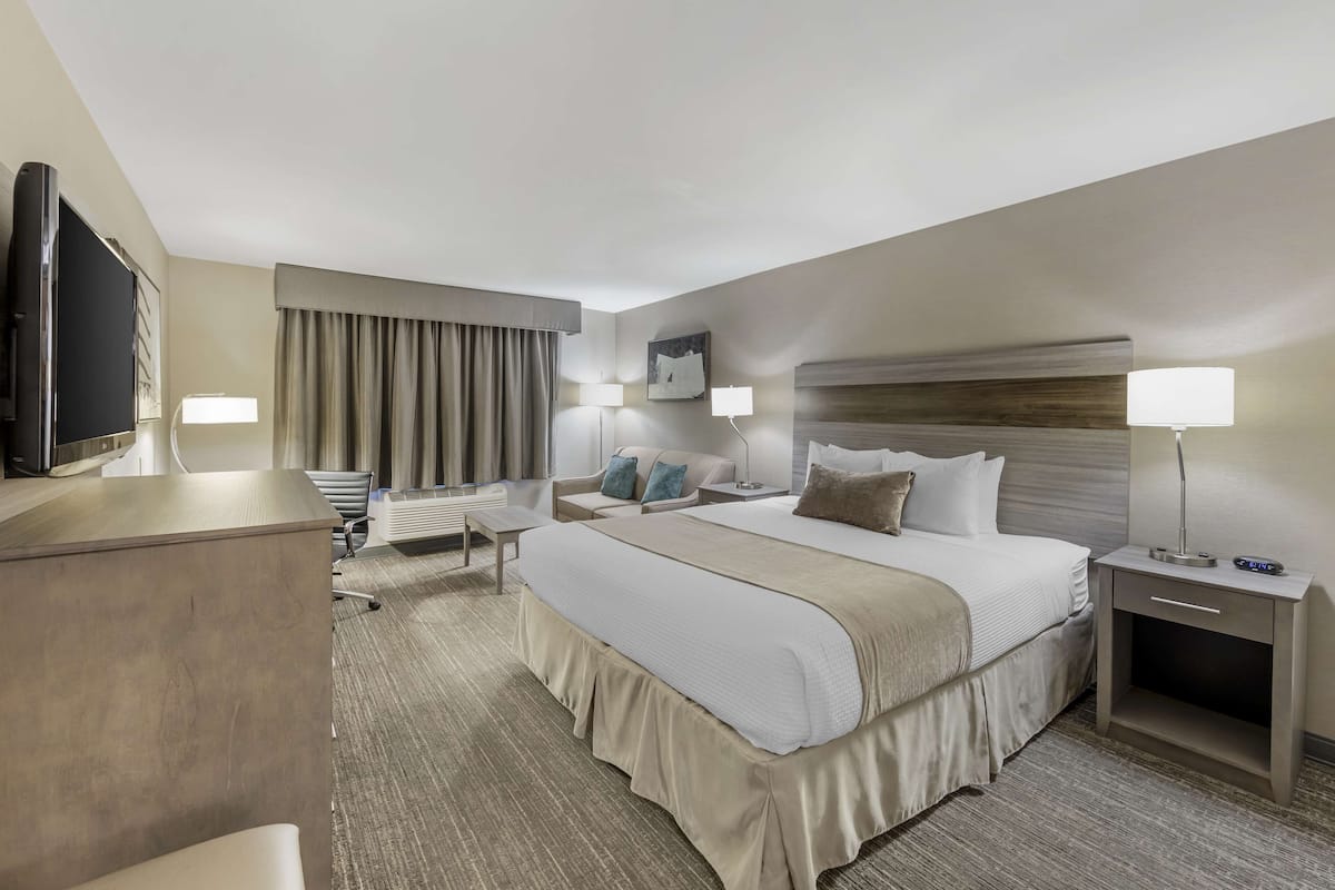 deluxe room, 1 king bed with sofa bed, non smoking, refrigerator & microwave (with sofabed) | premium bedding, blackout curtains, iron/ironing board