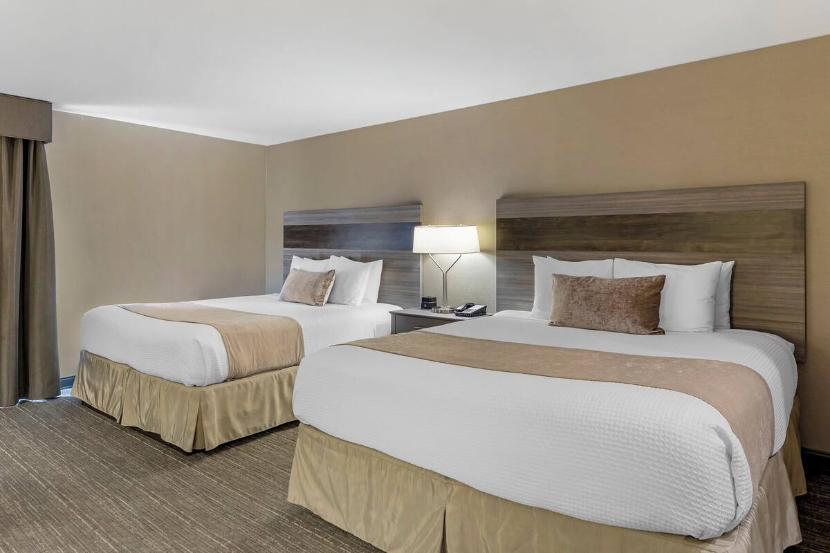Premium bedding, blackout curtains, iron/ironing board