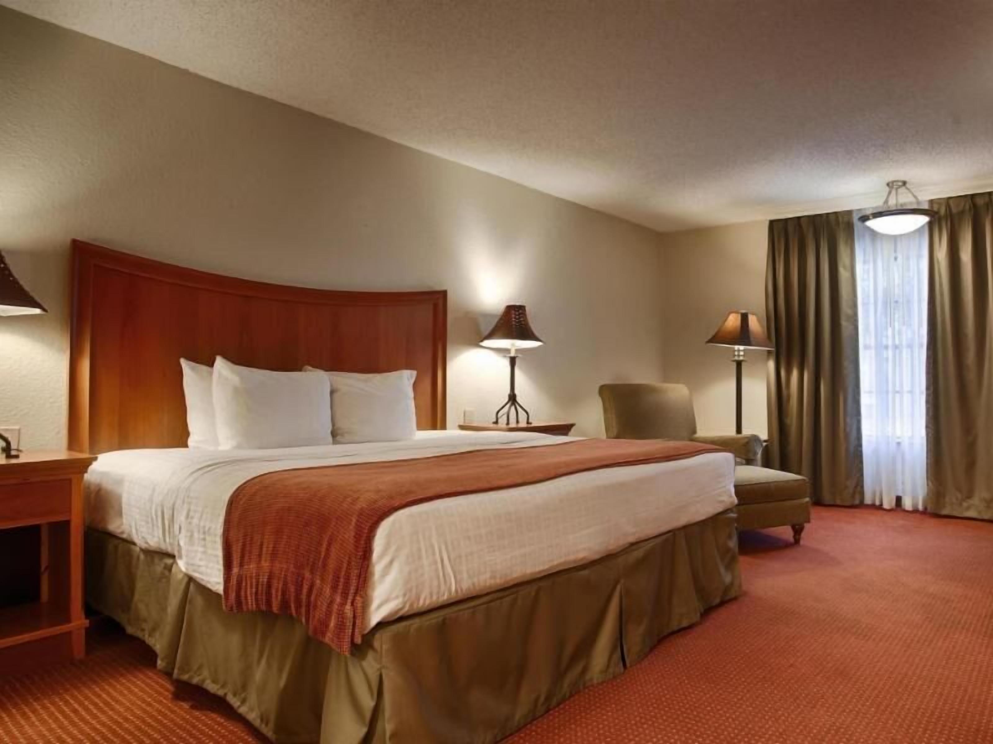 Ropa de cama de alta calidad, camas con pillow-top y muebles diferentes 