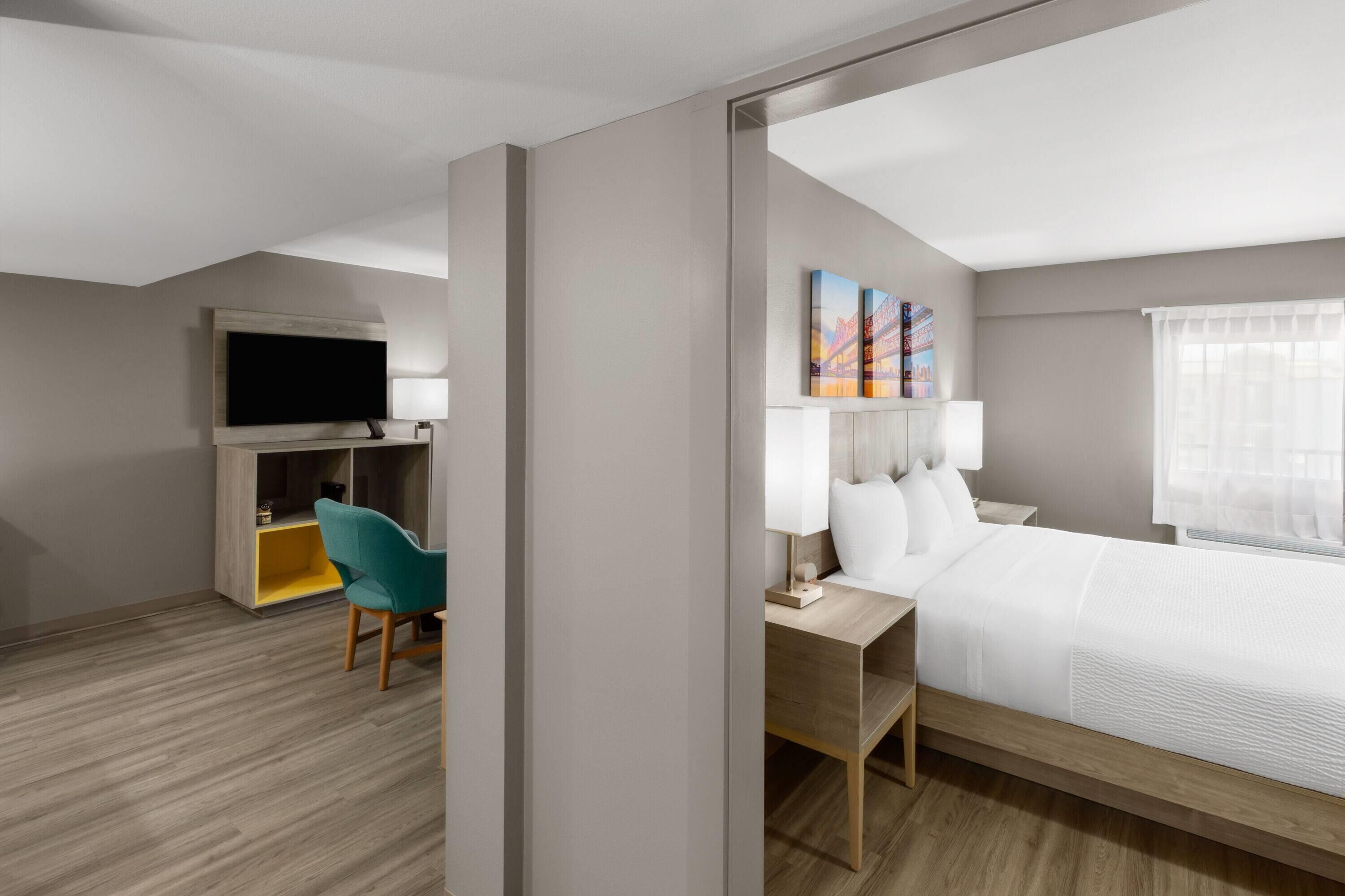 Suite, 1 King Bed with Sofa bed, Non Smoking | Desk, blackout curtains, iron/ironing board, free cots/infant beds